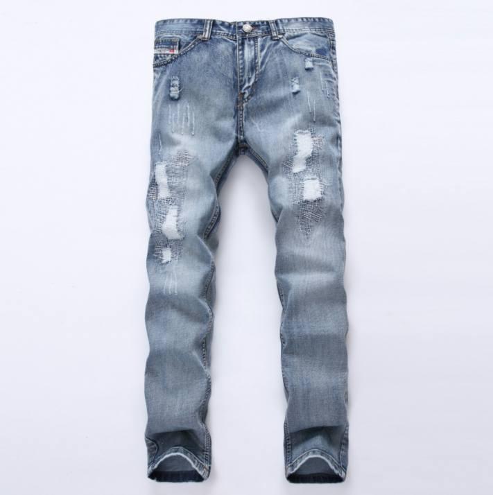 Distressed designer jeans best sale